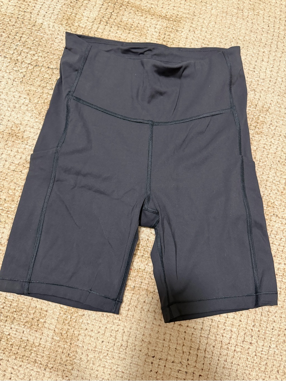 Athleta ultimate stash pocket running short 7”